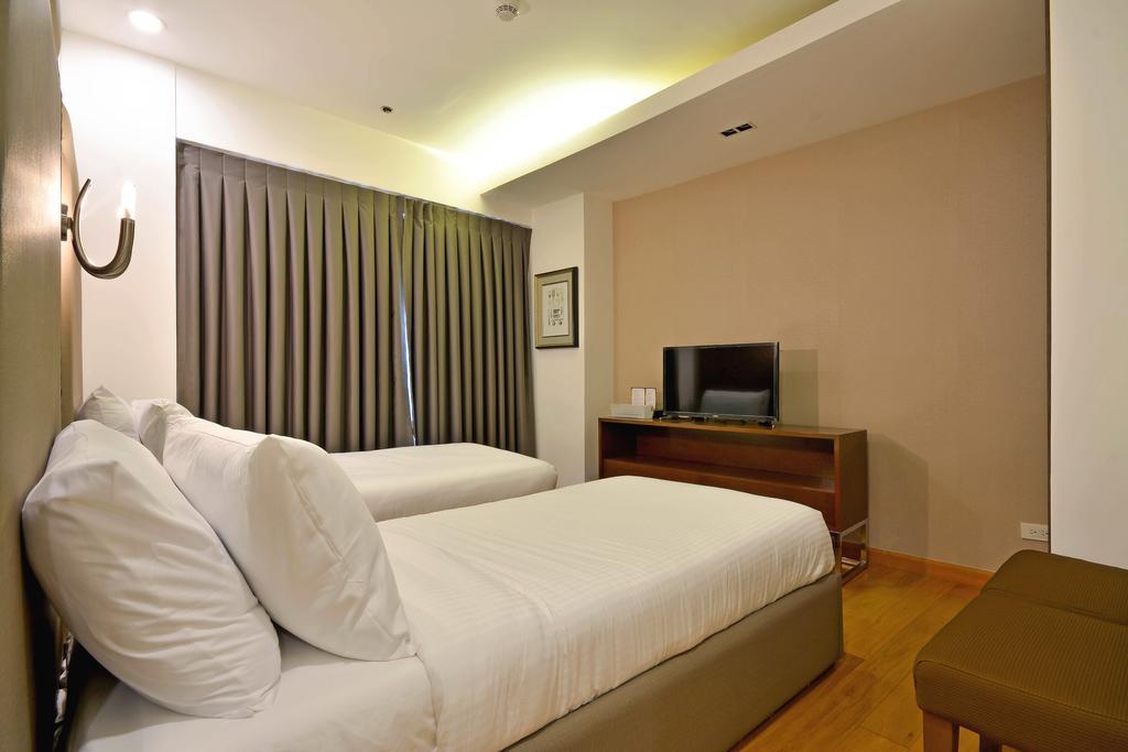 Milano Versace Suites Makati City Buitenkant foto
